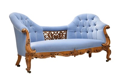 Lot 509 - Victorian carved walnut deep-buttoned camel-back settee or sofa
