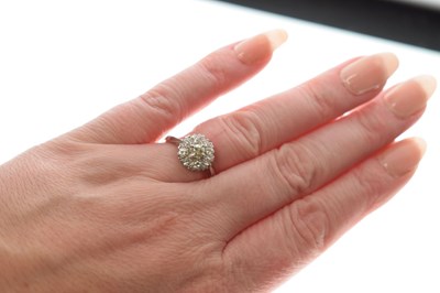 Lot 14 - Diamond 18ct yellow gold and white gold set cluster ring