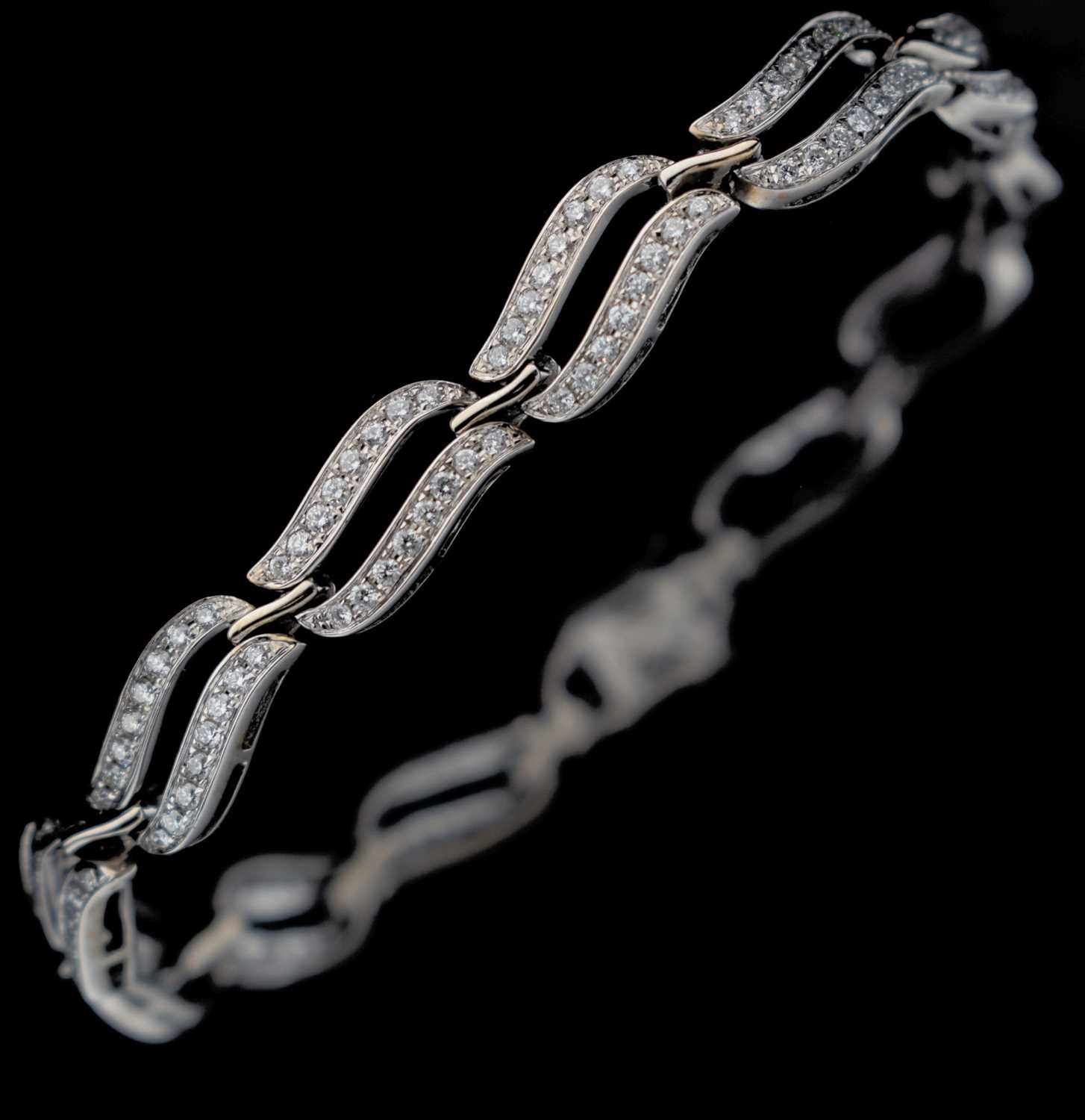 Lot 53 - Diamond 18ct white gold panel bracelet