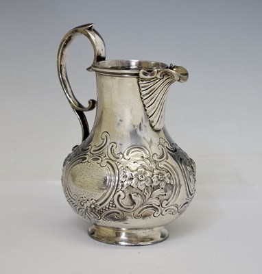 Lot 138 - Victorian silver jug with acanthus spout and scroll handle