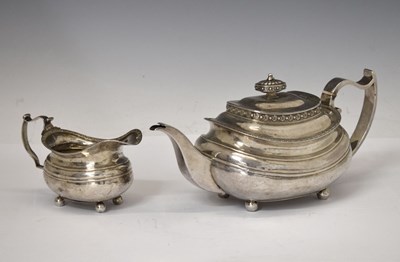 Lot 162 - Georgian silver teapot and cream jug
