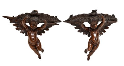 Lot 495 - Pair of late 19th or early 20th century Italian carved fruitwood wall brackets