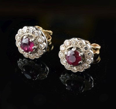 Lot 123 - Pair of ruby and diamond cluster ear studs