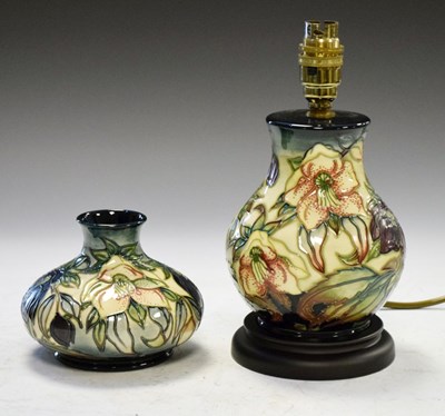 Lot 391 - Moorcroft Hellebore pattern vase together with a similar lamp base