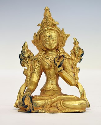 Lot 336 - Tibetan gilt bronze figure of a deity or bodhisattva