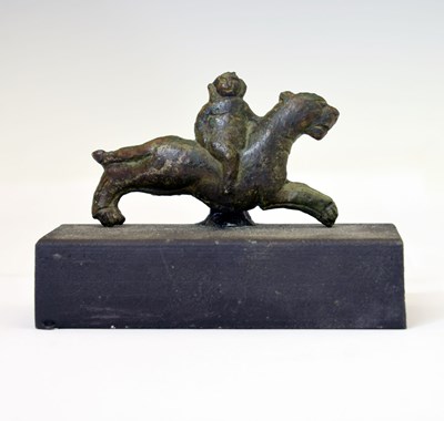 Lot 230 - Antiquities - Small bronze votive amulet, Bacchus or Dionysus with his panther