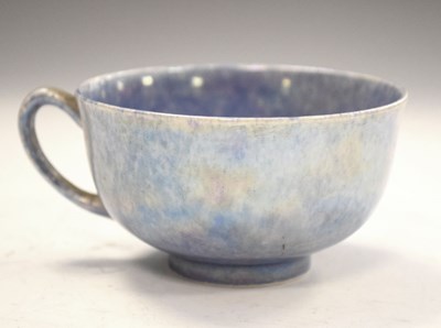 Lot 399 - Ruskin pottery tea cup in  lustre blue glaze