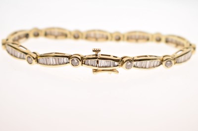 Lot 55 - Diamond 14ct yellow gold panel bracelet