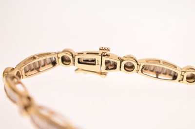 Lot 55 - Diamond 14ct yellow gold panel bracelet