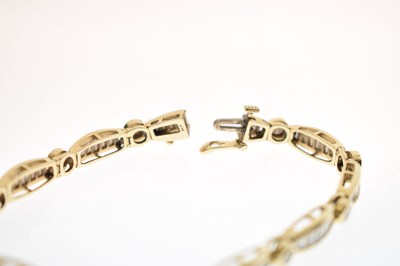 Lot 55 - Diamond 14ct yellow gold panel bracelet