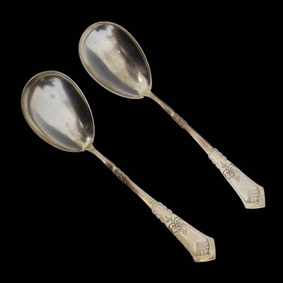 Lot 430 - Pair of Danish white metal spoons in a Georg Jensen (Retailers) box