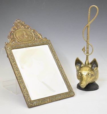 Lot 498 - Early 20th century brass fox head door stop, and a brass framed wall mirror
