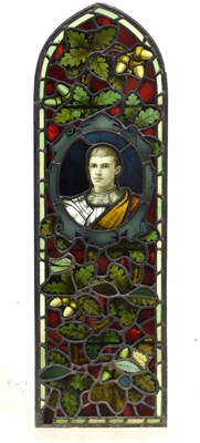Lot 190 - Stained and painted leaded glass panel of a young knight or warrior king