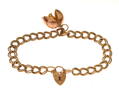 Lot 196 - 9ct gold curb link bracelet attached 9ct gold egg charm