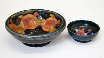 Lot 598 - Moorcroft - Walter Moorcroft 'Pomegranate' pattern footed bowl, etc