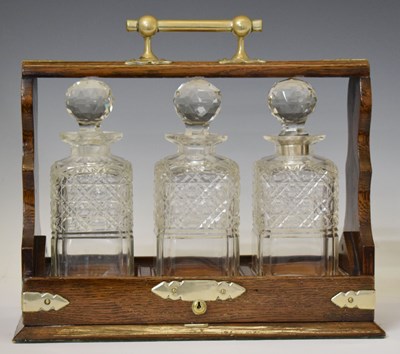 Lot 495 - Early 20th century oak cased tantalus