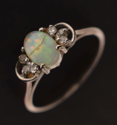 Lot 23 - Opal and diamond white gold ring