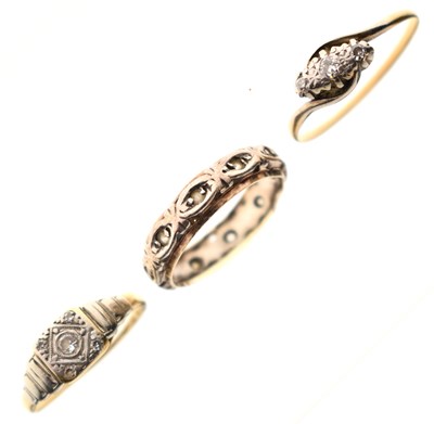 Lot 50 - Two early 20th century diamond rings and a yellow and white metal band