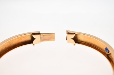 Lot 56 - Victorian diamond and sapphire unmarked yellow metal hinged bangle