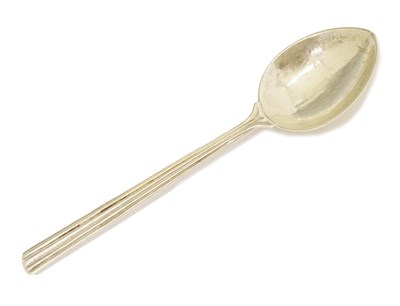Lot 121 - Omar Ramsden - George V silver rat tail spoon with planished finish