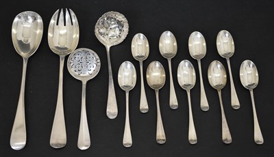 Lot 402 - Pair of George V silver salad servers, a matched set of teaspoons, and two silver sifting spoons