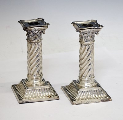 Lot 158 - Matched pair of low candlesticks of fluted swirl column form