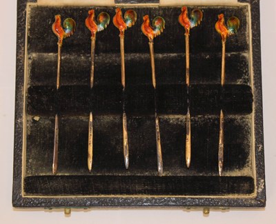 Lot 408 - Cased set of six silver gilt and enamel cocktail sticks with cockerel finials