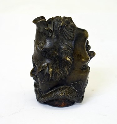 Lot 523 - Unusual cast bronze 'double head' water spout terminal
