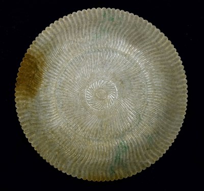 Lot 323 - Chinese celadon jade 'Chrysanthemum' dish