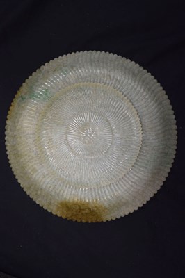 Lot 323 - Chinese celadon jade 'Chrysanthemum' dish