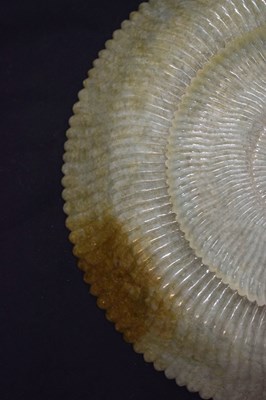 Lot 323 - Chinese celadon jade 'Chrysanthemum' dish