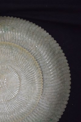 Lot 323 - Chinese celadon jade 'Chrysanthemum' dish