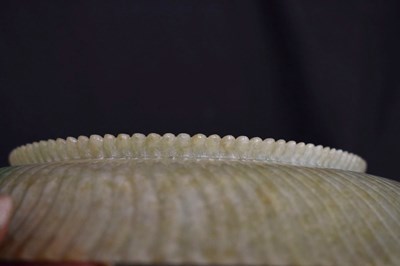 Lot 323 - Chinese celadon jade 'Chrysanthemum' dish
