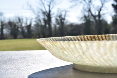 Lot 323 - Chinese celadon jade 'Chrysanthemum' dish