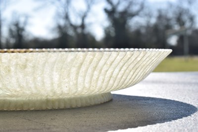 Lot 323 - Chinese celadon jade 'Chrysanthemum' dish