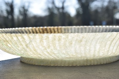 Lot 323 - Chinese celadon jade 'Chrysanthemum' dish