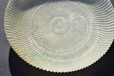 Lot 323 - Chinese celadon jade 'Chrysanthemum' dish