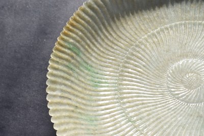 Lot 323 - Chinese celadon jade 'Chrysanthemum' dish