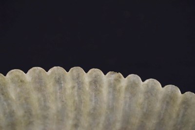 Lot 323 - Chinese celadon jade 'Chrysanthemum' dish
