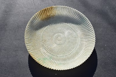 Lot 323 - Chinese celadon jade 'Chrysanthemum' dish