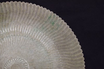 Lot 323 - Chinese celadon jade 'Chrysanthemum' dish
