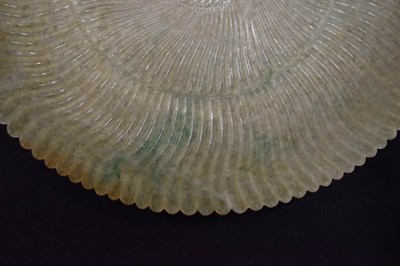 Lot 323 - Chinese celadon jade 'Chrysanthemum' dish