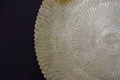 Lot 323 - Chinese celadon jade 'Chrysanthemum' dish