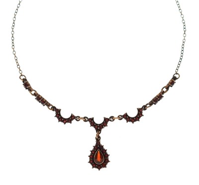Lot 155 - Bohemian garnet yellow metal necklace