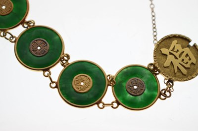 Lot 65 - Chinese jade and yellow metal 'coin' bracelet, Wang Hing, Hong Kong