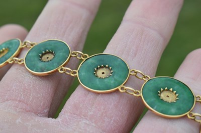 Lot 65 - Chinese jade and yellow metal 'coin' bracelet, Wang Hing, Hong Kong