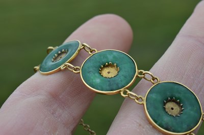 Lot 65 - Chinese jade and yellow metal 'coin' bracelet, Wang Hing, Hong Kong