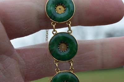 Lot 65 - Chinese jade and yellow metal 'coin' bracelet, Wang Hing, Hong Kong