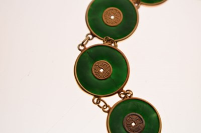 Lot 65 - Chinese jade and yellow metal 'coin' bracelet, Wang Hing, Hong Kong