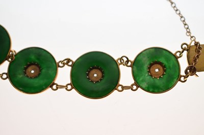 Lot 65 - Chinese jade and yellow metal 'coin' bracelet, Wang Hing, Hong Kong